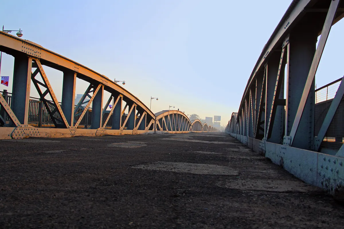 Historic steel truss sections of Ellis Bridge spanning the Sabarmati in Ahmedabad