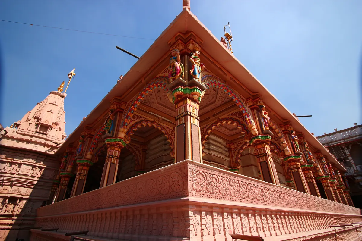 Colourfully carved pavilion and temple architecture at Swaminarayan Mandir Kalupur in Ahmedabad